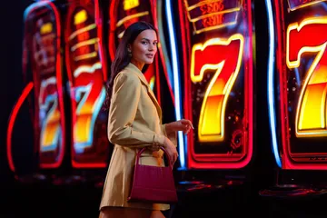 A stylish woman beside vibrant slot machines displaying glowing sevens, showcasing the variety of top slots at SPINARA.