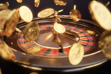 A close-up shot of golden coins falling around a spinning roulette wheel, representing immersive casino action at SPINARA.