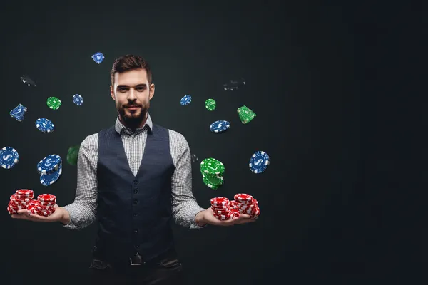 SPINARA Login — Instantly access your secure account A confident dealer surrounded by casino chips inviting players to access their SPINARA account, reflecting quick and easy login options.